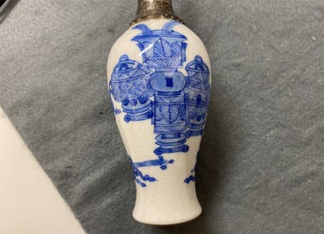 Three Chinese silver-mounted blue and white vases and a teapot, Kangxi